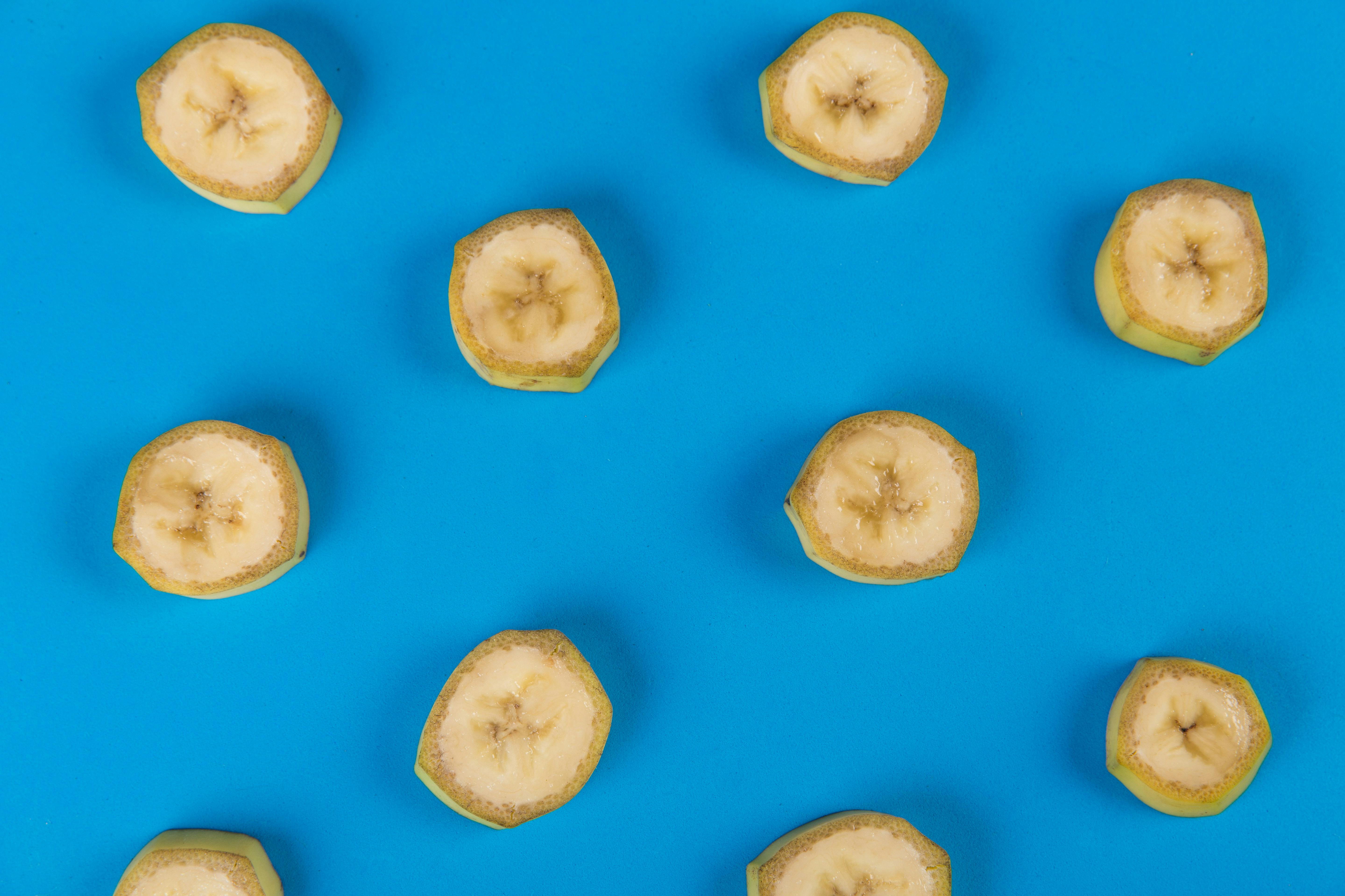 slices of banana on blue(?) background